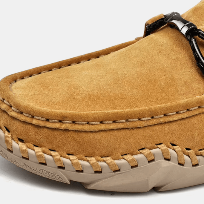 Fiorenzo Hand-Stitched Loafers in suede, highlighting luxury and slip-on comfort with premium hand-stitched craftsmanship for formal style.