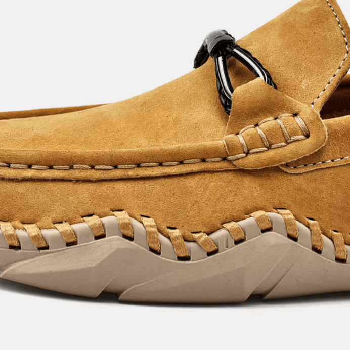 Fiorenzo Hand-Stitched Loafers in suede, showcasing hand-stitched detailing and a durable sole. Perfect men's leather loafers for formal and luxury style.