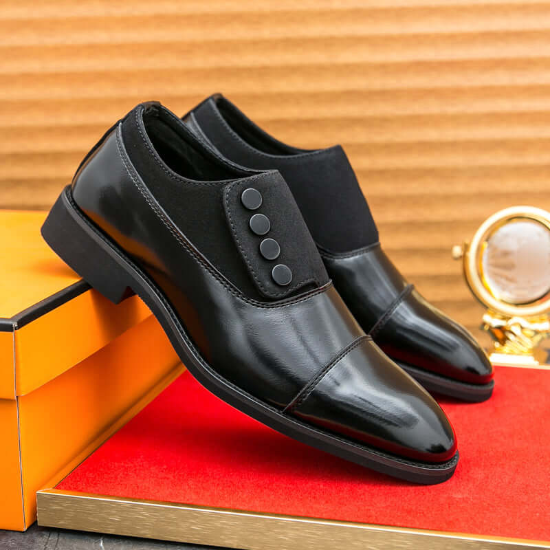Giotto dual tone men's dress shoes with leather and suede, cushioned insole, and cap toe silhouette displayed on a red surface.