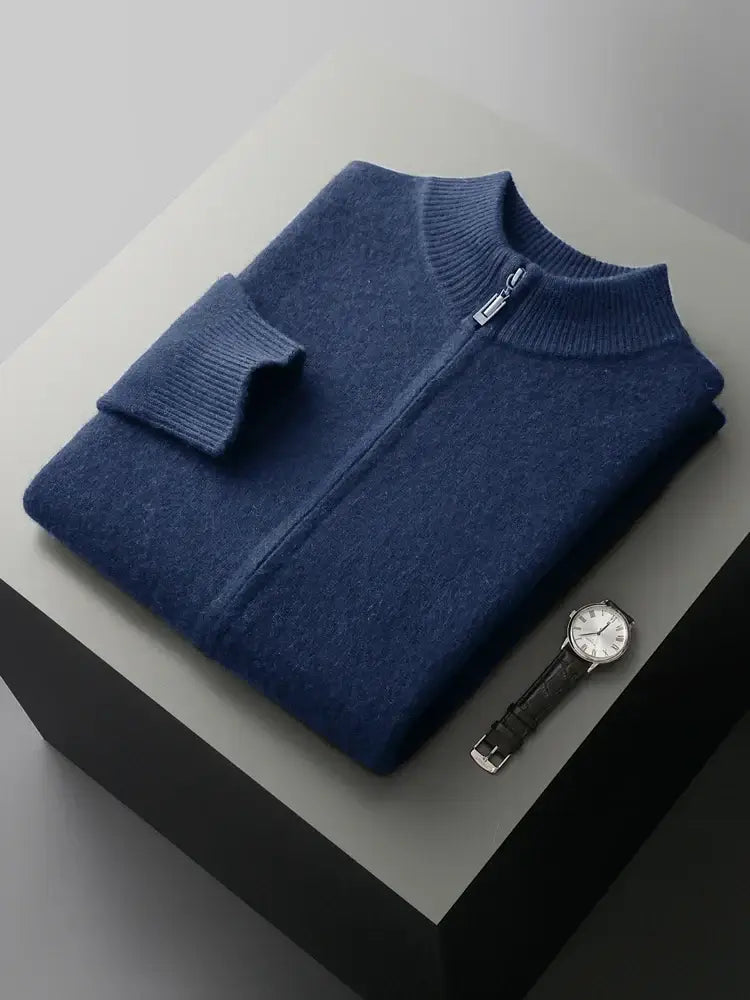 Men's Merino Crest Cardigan in navy blue, crafted from 100% merino wool, offering superior warmth and comfort for winter wear.