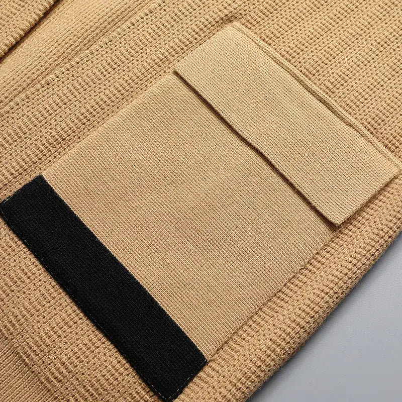 Padova Knit Cardigan featuring textured knit with flap pocket, showcasing warm winter style for men’s comfort and layering. Ideal knitted sweater.