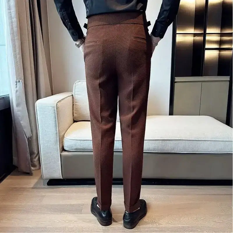 Rear view of Veneto Dress Pants showcasing waffle weave pattern and adjustable side tabs, perfect men's casual trousers for comfort and style.