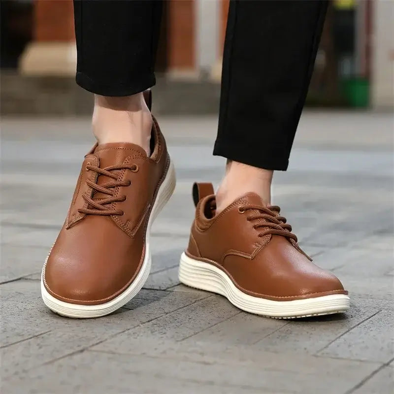 Carvelli Leather Sneakers: Men's casual sneakers in brown leather, lightweight, comfortable for everyday wear and travel.