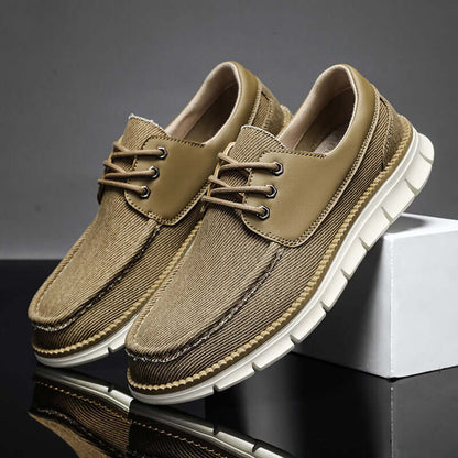 Denton Slip-On Sneakers with denim canvas, ideal for men seeking stylish, comfortable everyday wear. Lightweight and breathable design.