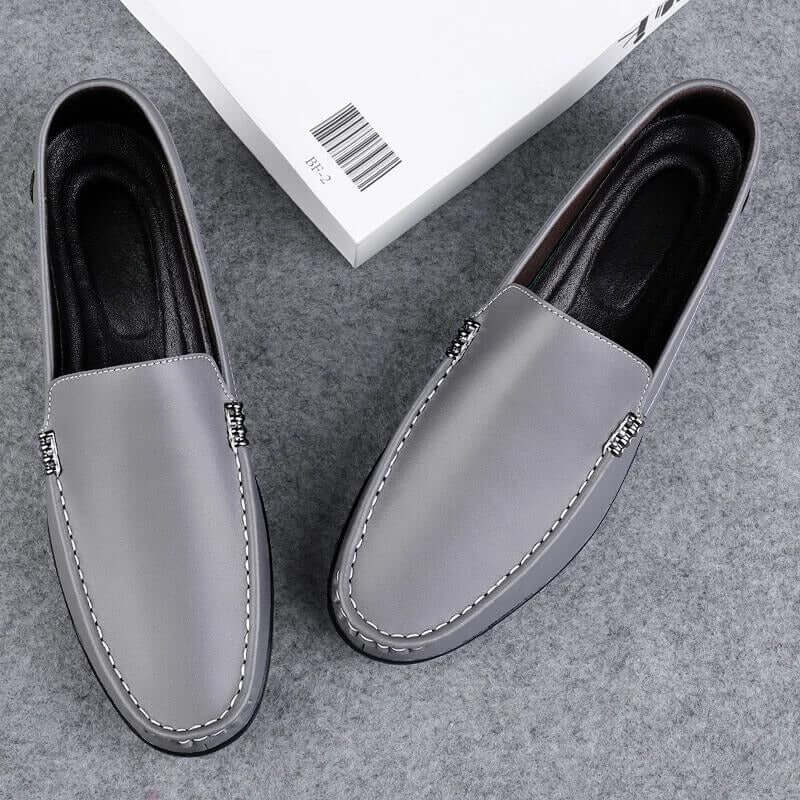 Ellis Leather Loafers in grey, men's slip-on luxury shoes with foam-padded insoles for ultimate comfort and elegance.