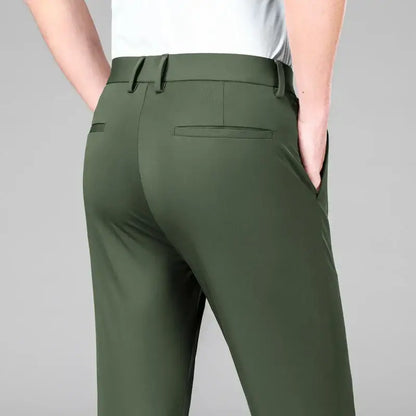 The Everyday Pants for men in green, showcasing breathable ice silk fabric and flexible fit for versatile casual and formal wear.
