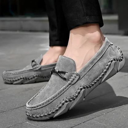 Fiorenzo Hand-Stitched Loafers showcasing elegant slip-on design, crafted from premium suede with hand-stitched detailing, suitable for formal wear.