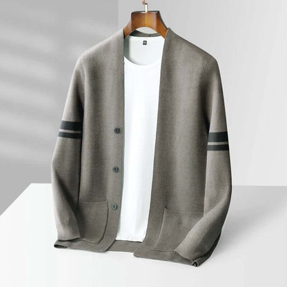 Giancarlo Cardigan for men in merino wool blend, minimalist design with sleeve stripes, offering warmth and comfort; ideal winter knitwear choice.