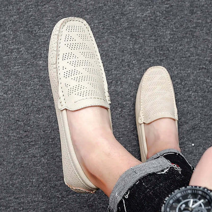 Giuliano Leather Loafers showcasing elegant perforated design and slip-on comfort.