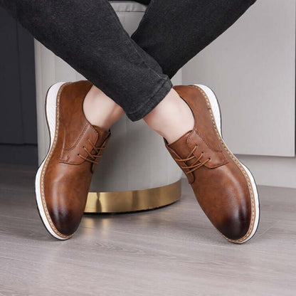 Livorno Hybrid Shoes in brown leather showcasing slip-on design and cushioned footbed for casual and business wear.