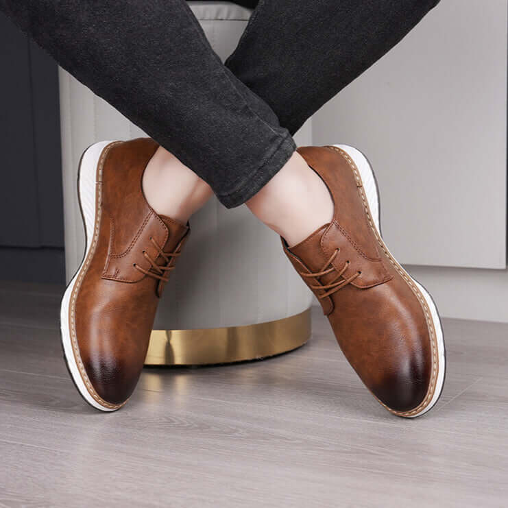 Livorno Hybrid Shoes in brown leather showcasing slip-on design and cushioned footbed for casual and business wear.