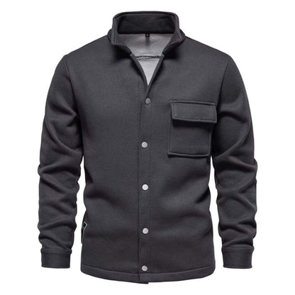 Men's premium winter jacket in dark gray with button closure and front pocket, stylish and warm for winter fashion.