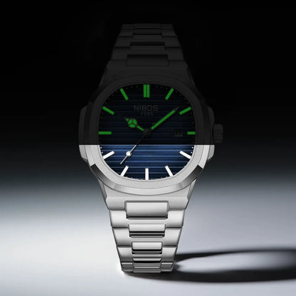 Quartz watch - Rivano Prestige 40 featuring a sleek silver bracelet and elegant blue dial, showcasing understated luxury and modern confidence.