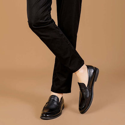 Regente Cowhide Leather Loafers on model, showcasing elegance and slip-on comfort for modern sophistication.