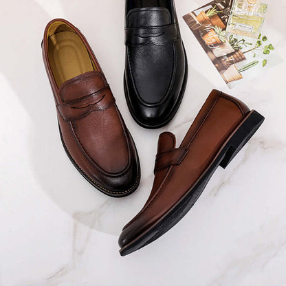 Regente Cowhide Leather Loafers for men in brown and black, showcasing elegant slip-on design and premium cowhide leather for formal style.