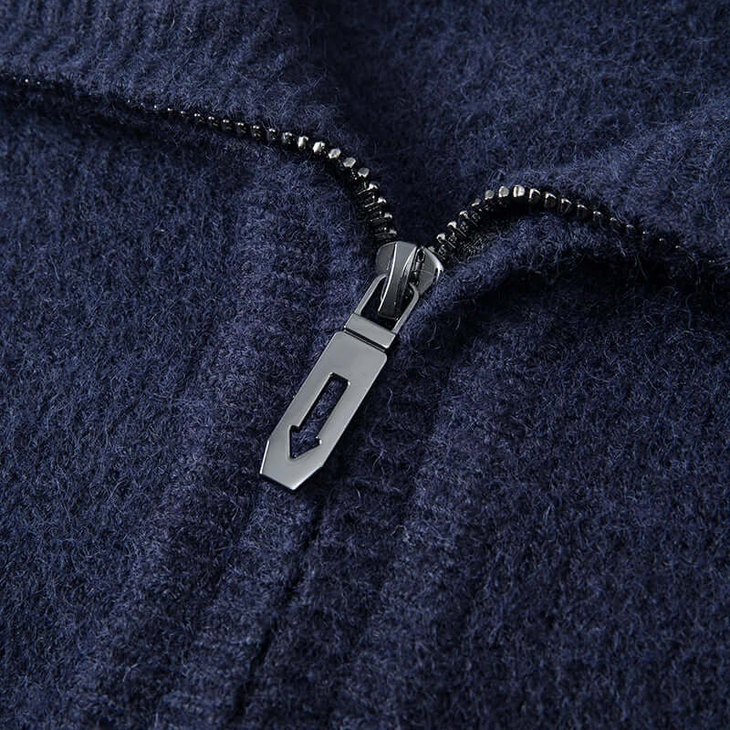 Close-up of Sinclair Sweater in navy blue, showcasing soft, warm 100% natural wool and stylish zip detail, perfect knitted sweater for men.
