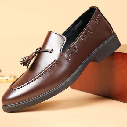 Valente Leather Tassel Loafers showcasing sleek design and tassel detail, ideal for elegant formal wear with slip-on comfort and synthetic leather finish.